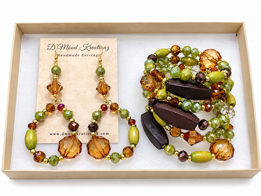 The Perfect Complement IV green and gold beaded wrap bracelet set with matching drop earrings, featuring olive green, amber and brown beads with gold -tone accents, presented in a gift box by D'Mood Kreationz.