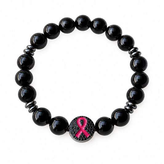 Black onyx gemstone awareness bracelet featuring glossy black beads, gunmetal hematite spacers accents, and a round charm with pink awareness ribbon.