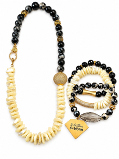 Everything women's necklace and three-bracelet set featuring black, gray marbled agate beads, cream shell chip beads and gold tone accents