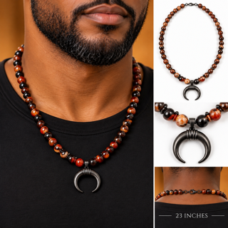 Man wearing Moonfire men's fire agate necklace with hematite crescent pendant, 23 inches long.